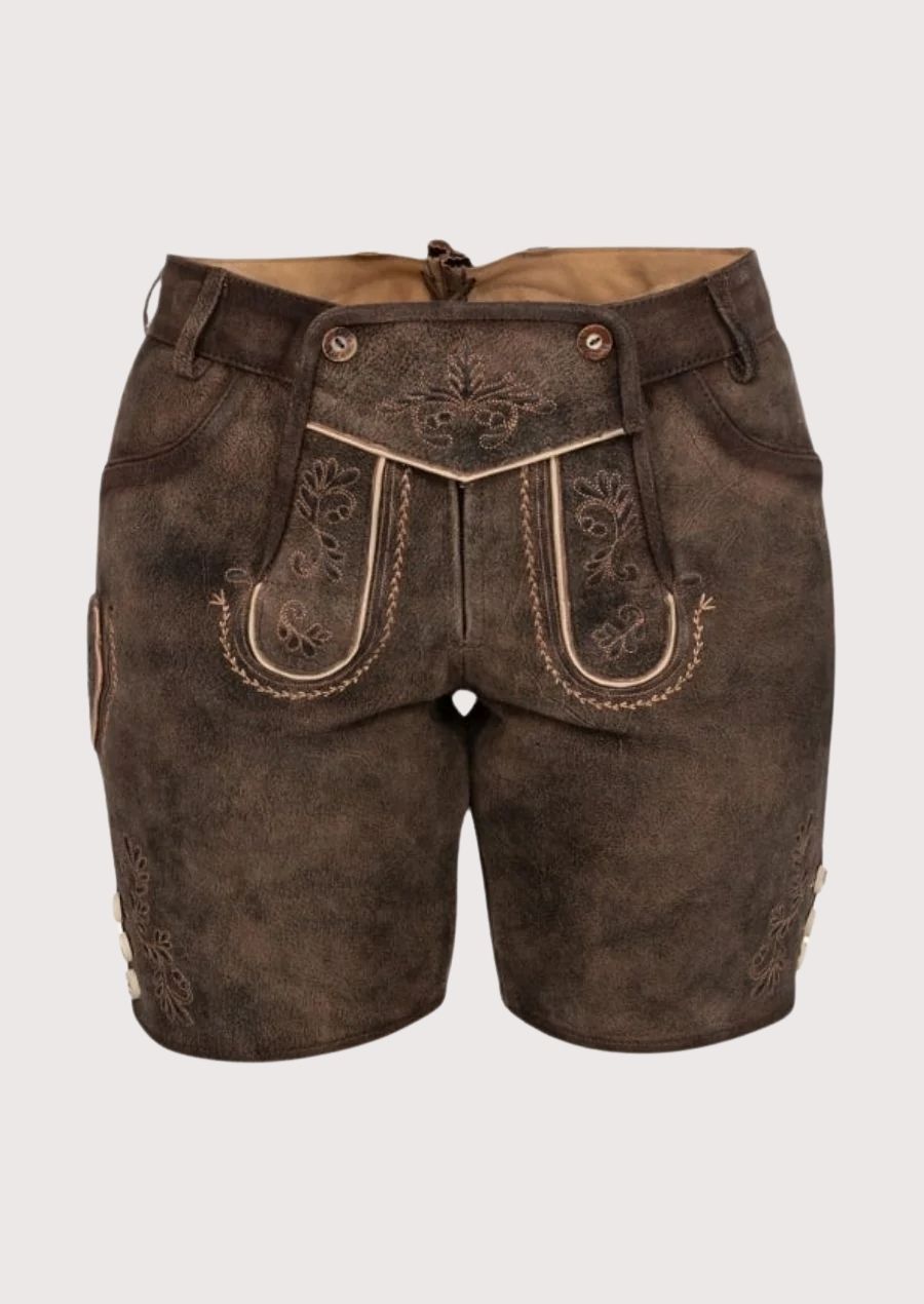 Front view of women’s rustic brown lederhosen shorts with embroidered flap detail