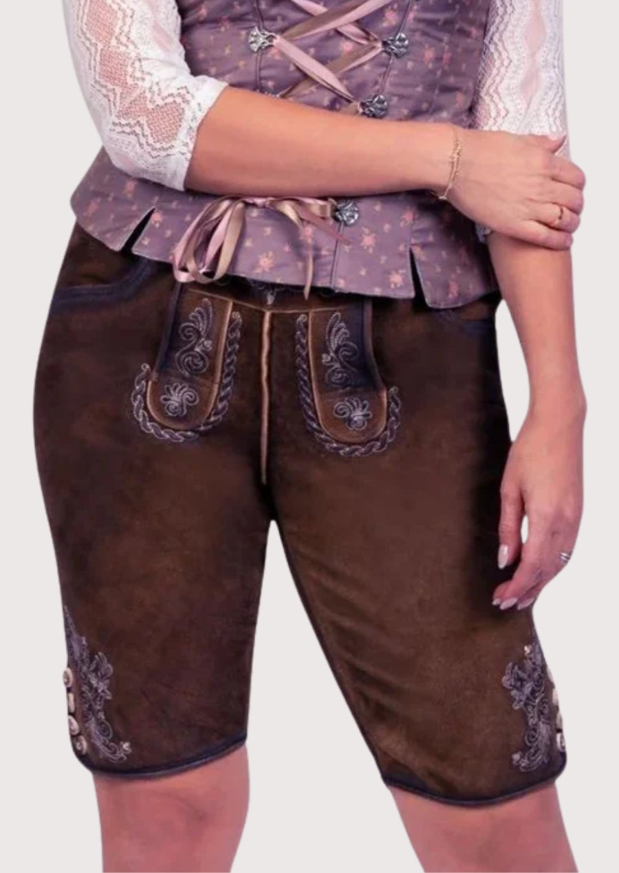 Traditional women’s suede Bundhosen featuring alpine embroidery details