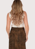 Modern women’s trachten leather skirt styled with lace top