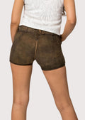 Women's traditional Alpine lederhosen style showcasing embroidered detailing, rich brown suede, and heritage appeal.