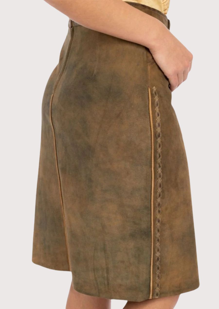 Traditional women’s leather skirt styled with casual top